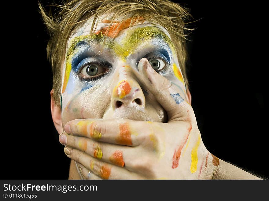 Clown portrait on a black background. Clown portrait on a black background