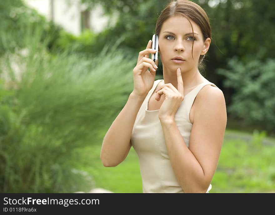 Attractive business woman over white background.