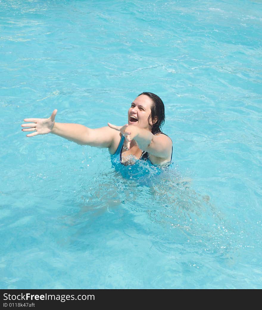 Joyful woman in the water