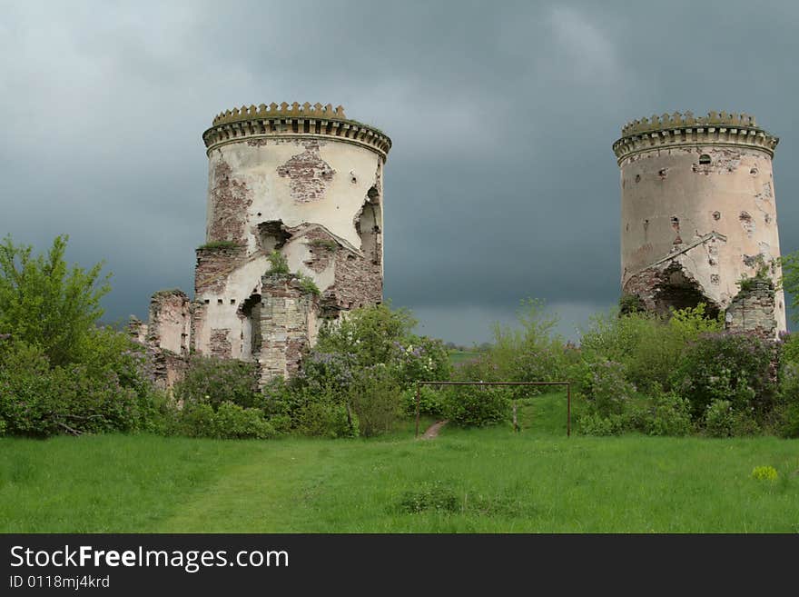 Ancient towers on the dark sky - ruins of strong castle in Chervonograd (Ukraine). Ancient towers on the dark sky - ruins of strong castle in Chervonograd (Ukraine)