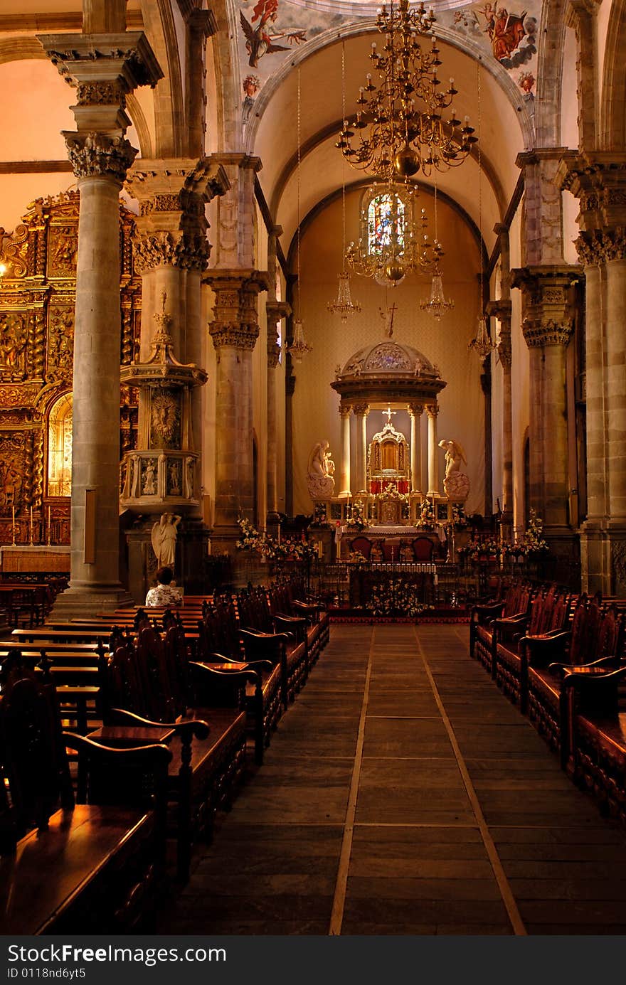 Woman on the bench in church