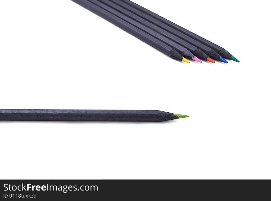 Red, pink, yellow, green and blue pencils made of black wood. Red, pink, yellow, green and blue pencils made of black wood