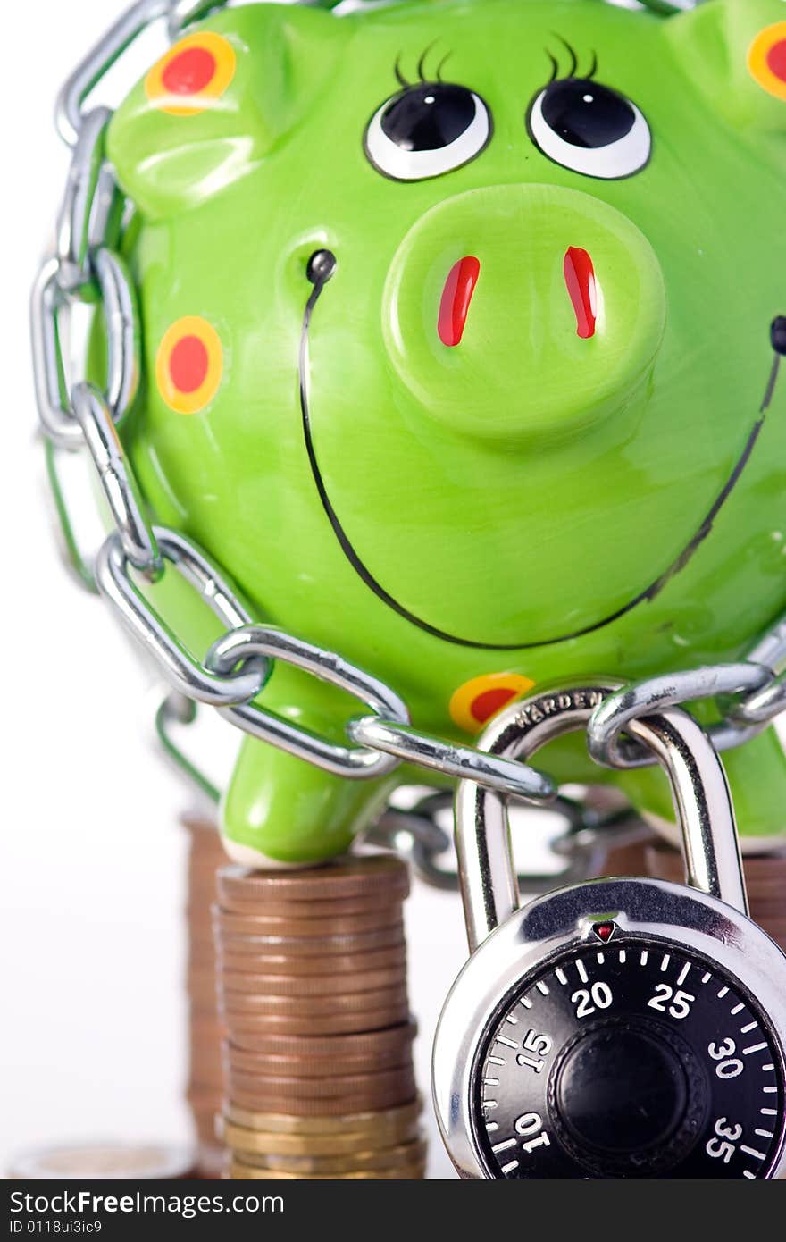 Piggy bank locked in chain