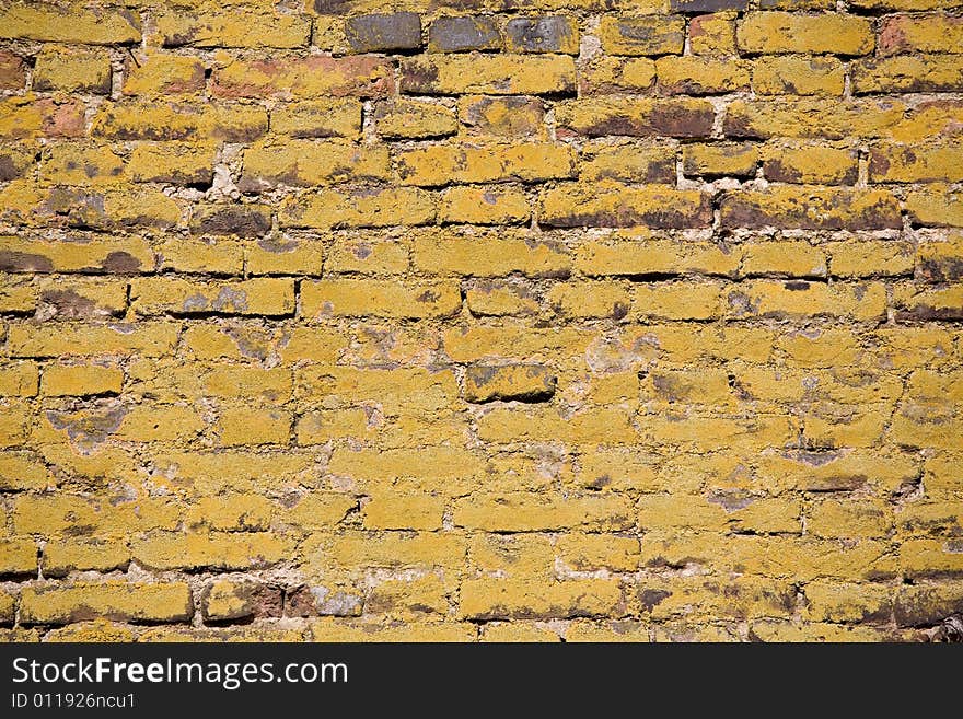 Structure of old mossy wall in Prague. Background texture.