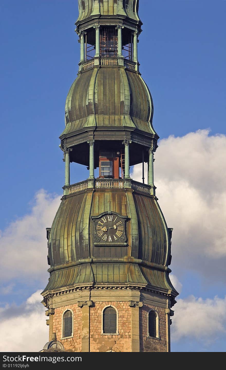 Clock on a facade of St Peter's church in Riga. Clock on a facade of St Peter's church in Riga.