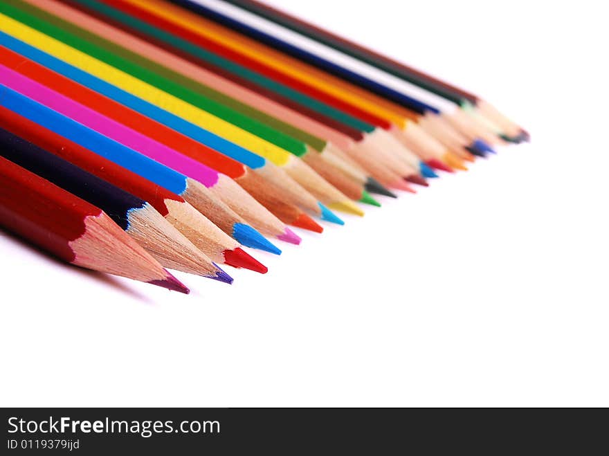 Many colorful pencils isolated on white background