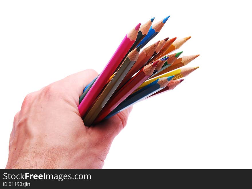 Colorful pencils in hand