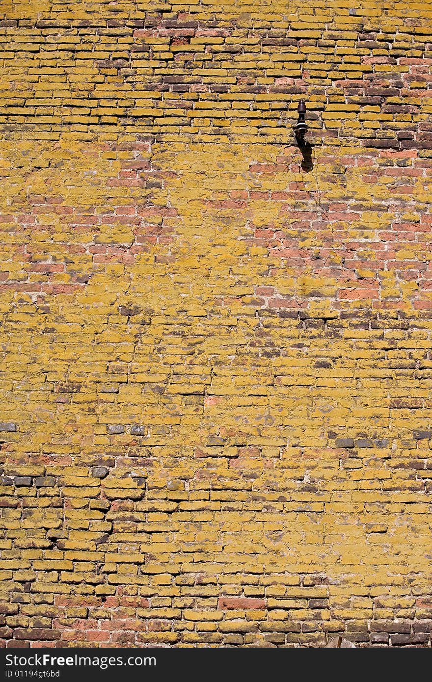 Structure of old mossy wall in Prague. Background texture.