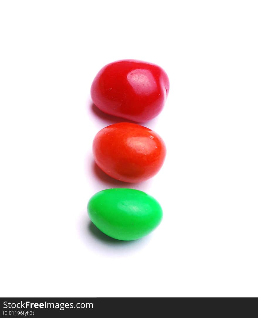 Three colorful candies