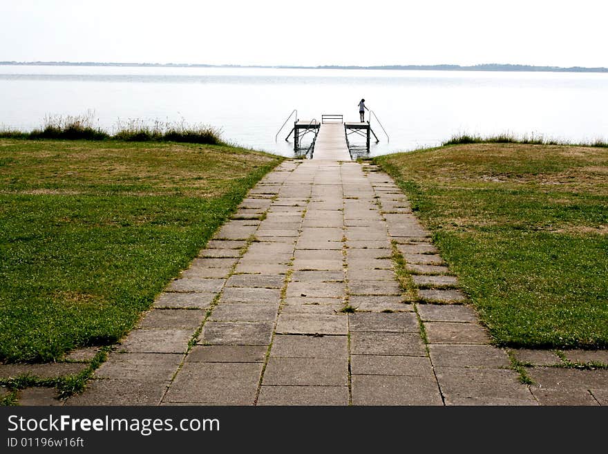 A pier stretching out into Limfjorden, Denmark. A pier stretching out into Limfjorden, Denmark