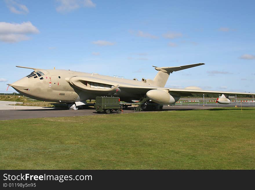 Victor bomber on ground with grass in foreground and blue sky in background