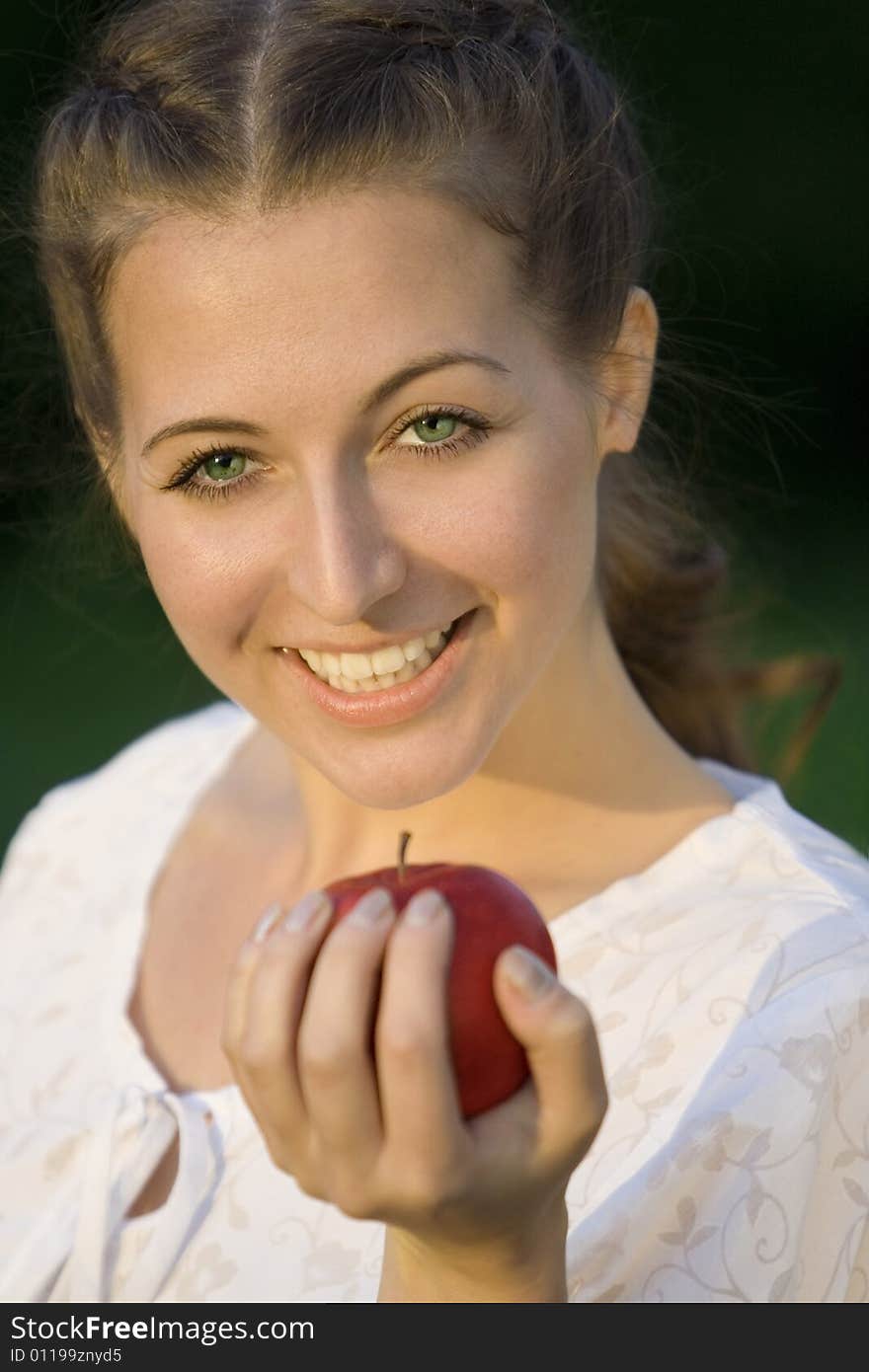 Smilling woman with red apple. Smilling woman with red apple