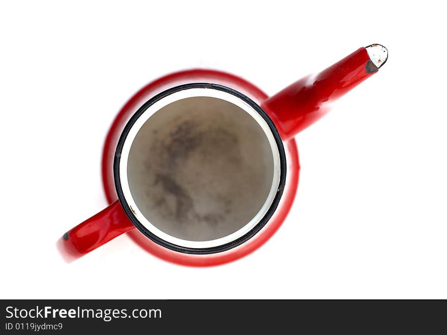 Empty red enameled pot locked from top on white background. Empty red enameled pot locked from top on white background