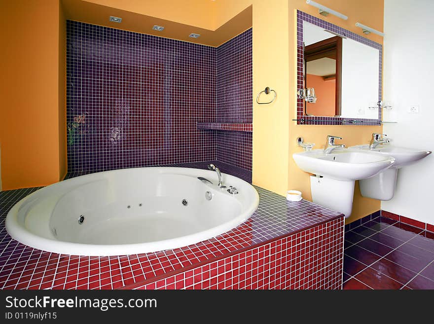 Master bathroom with large tub and vanity of modern home