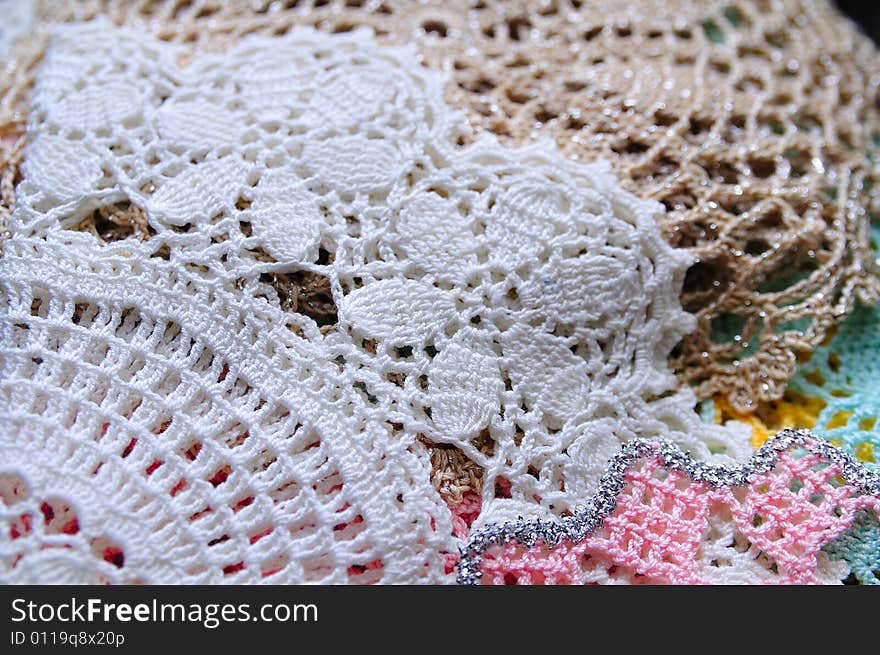 A chest full of embroidery works and laces, close shot. A chest full of embroidery works and laces, close shot