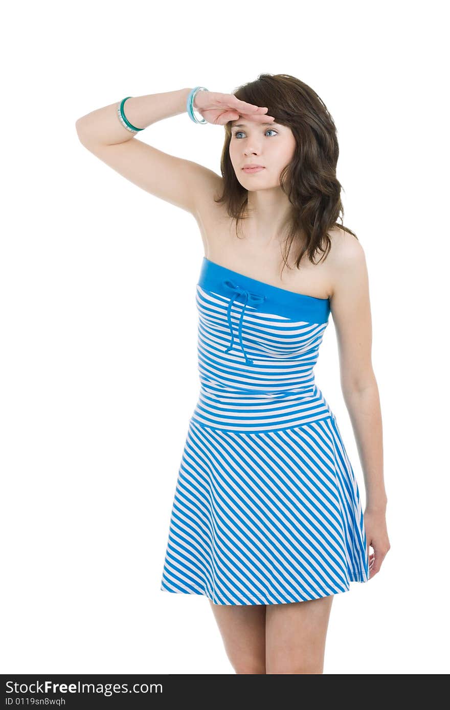 Pretty woman in the blue striped dress looking and waiting. Pretty woman in the blue striped dress looking and waiting