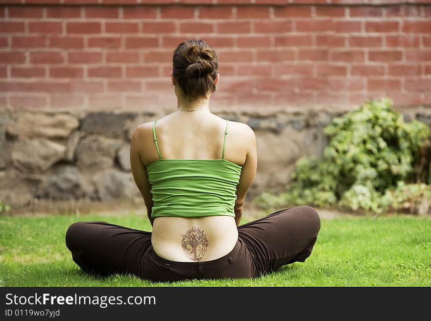 Woman with a Tattoo on Her Back