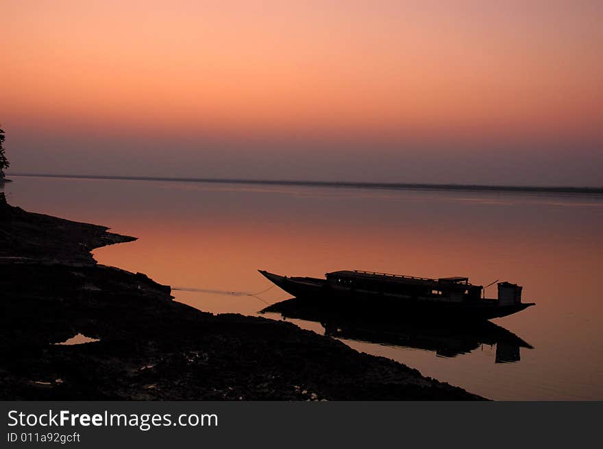 Sunset on the river of West Bengal-India. Sunset on the river of West Bengal-India.