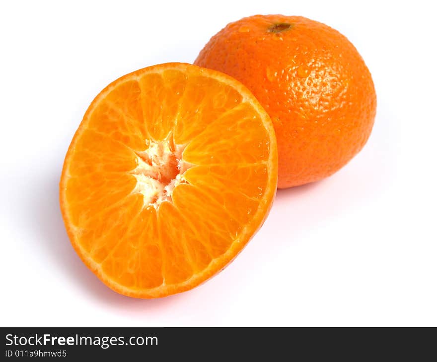 Organic Tangerine and a half, on white background