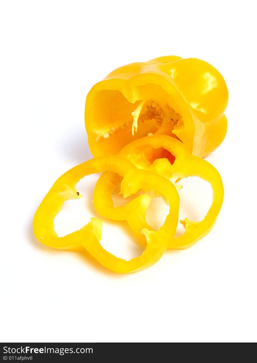 Sliced yellow pepper on white background