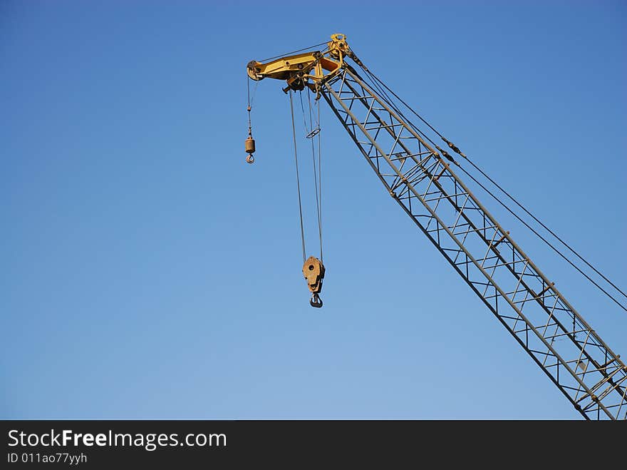 crane isolated by blue sky