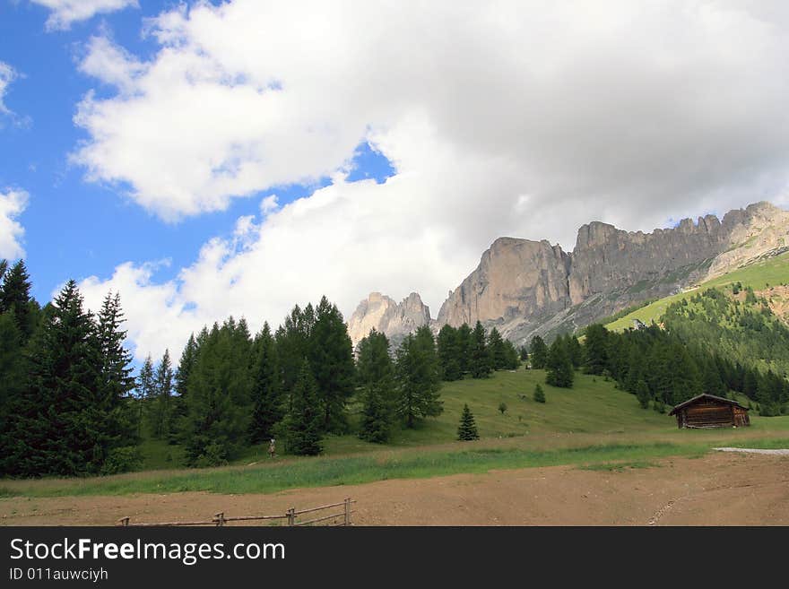 Sella montain group, green valley and woods. Italy. Sella montain group, green valley and woods. Italy