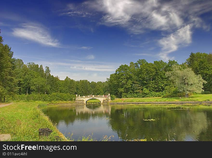 Landscape with blue sky, clouds, forest and lake. Landscape with blue sky, clouds, forest and lake