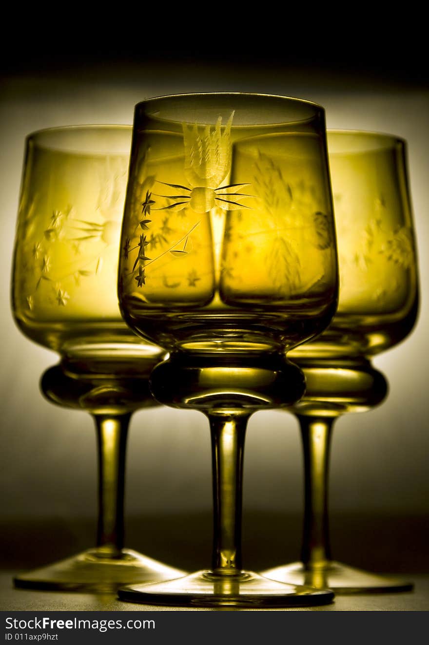 Three beautiful back lit wine glasses. Three beautiful back lit wine glasses