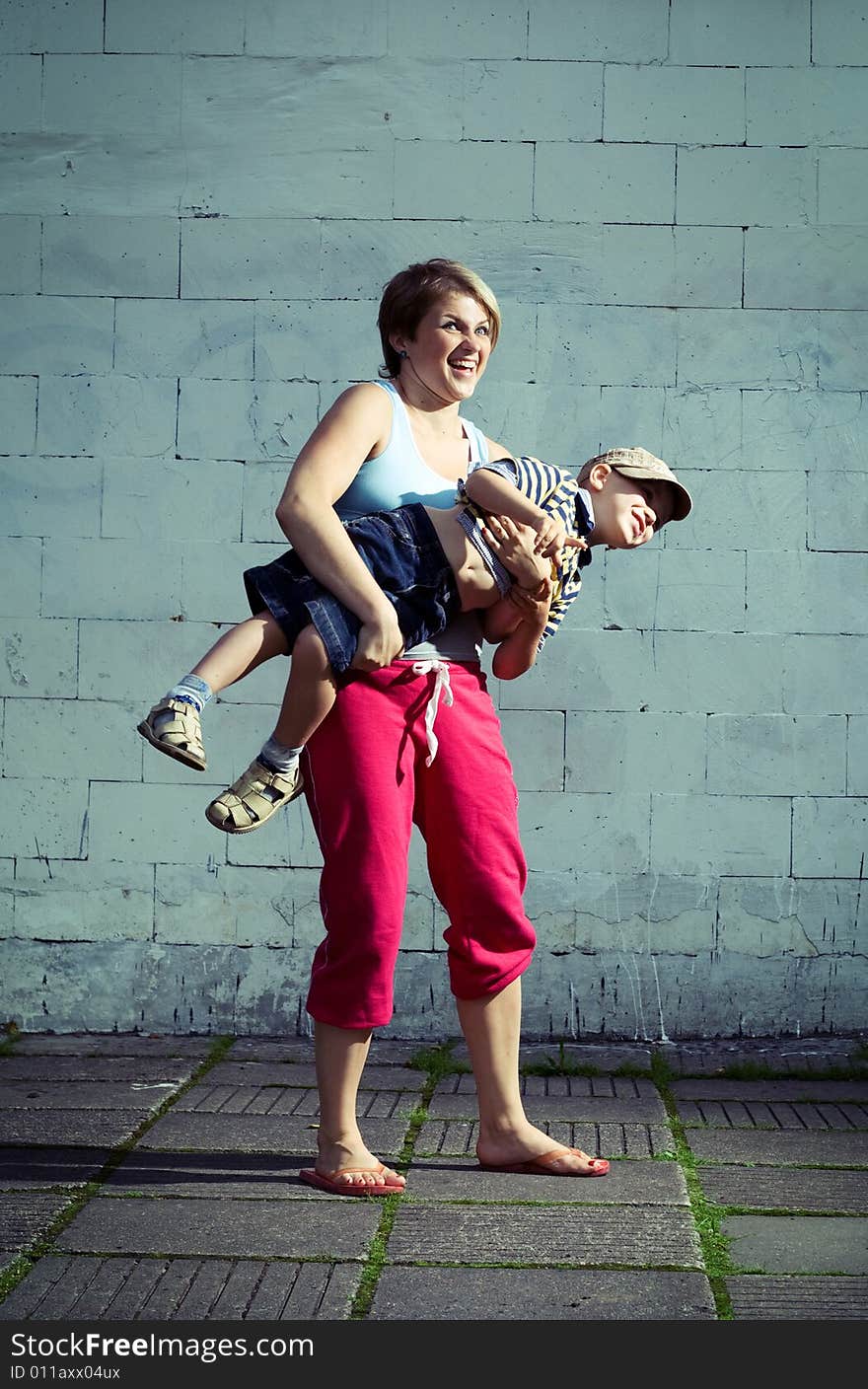 Mother holding her son.