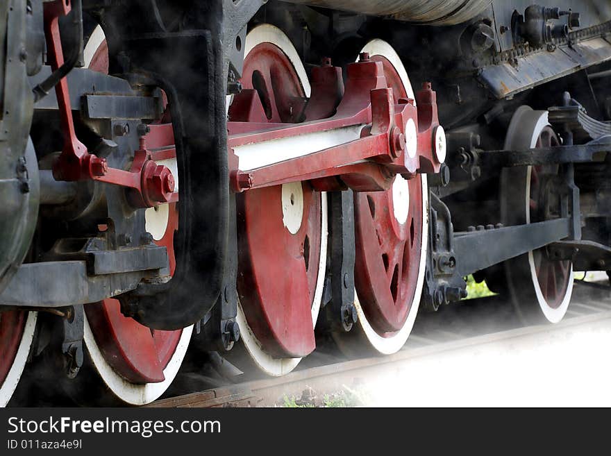 The wheel of an outdated vapour locomotive, it has already had a history of 80 years. The wheel of an outdated vapour locomotive, it has already had a history of 80 years.