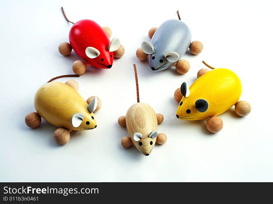 Five wooden mice