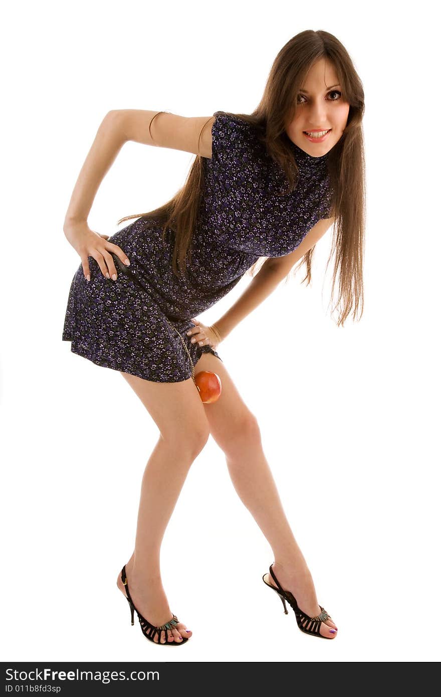 Young beautiful girl with apple on the white. Young beautiful girl with apple on the white