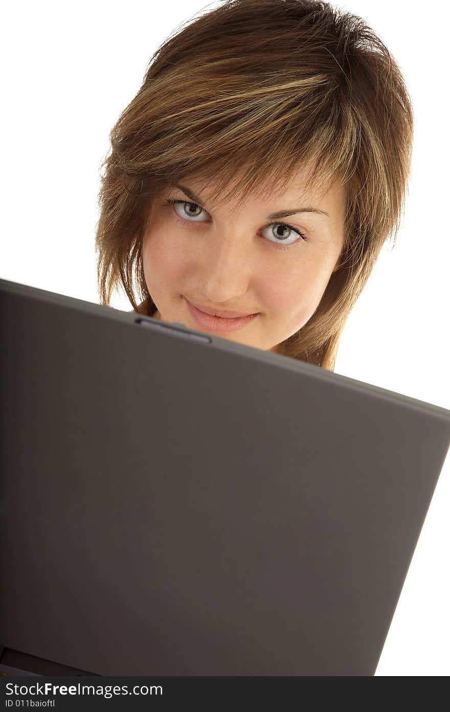 Cute young woman with laptop on the white. Cute young woman with laptop on the white