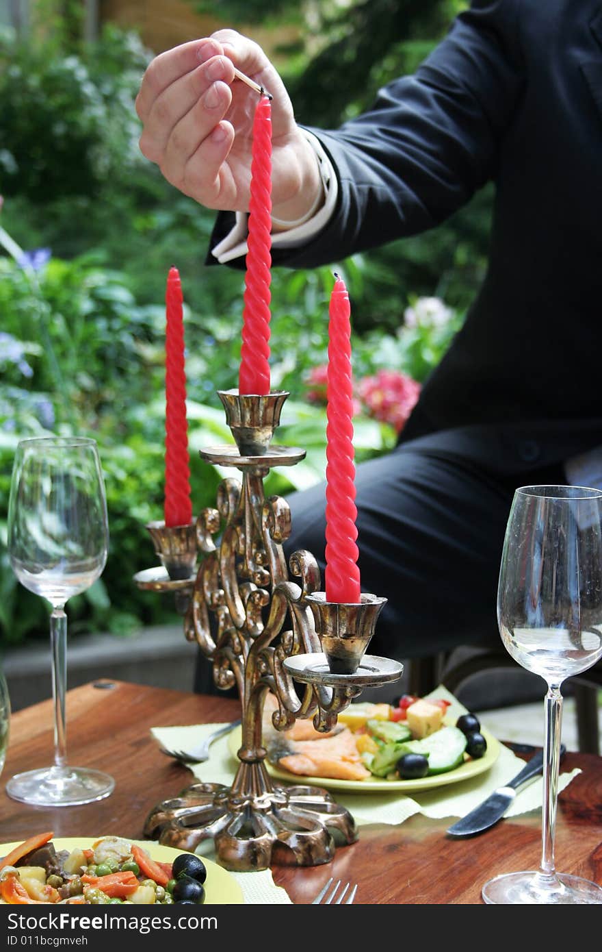 Person Lighting Candle