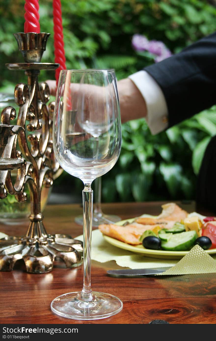 Crystal glass on the table. Outdoor.