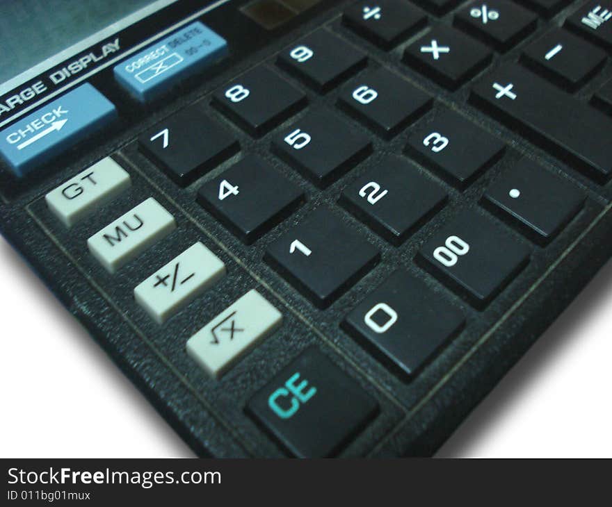 Close-up of a black color calculator on a white background