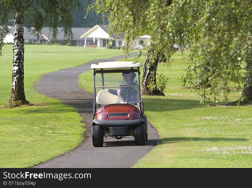 Driving In Golf Cart - horizontal