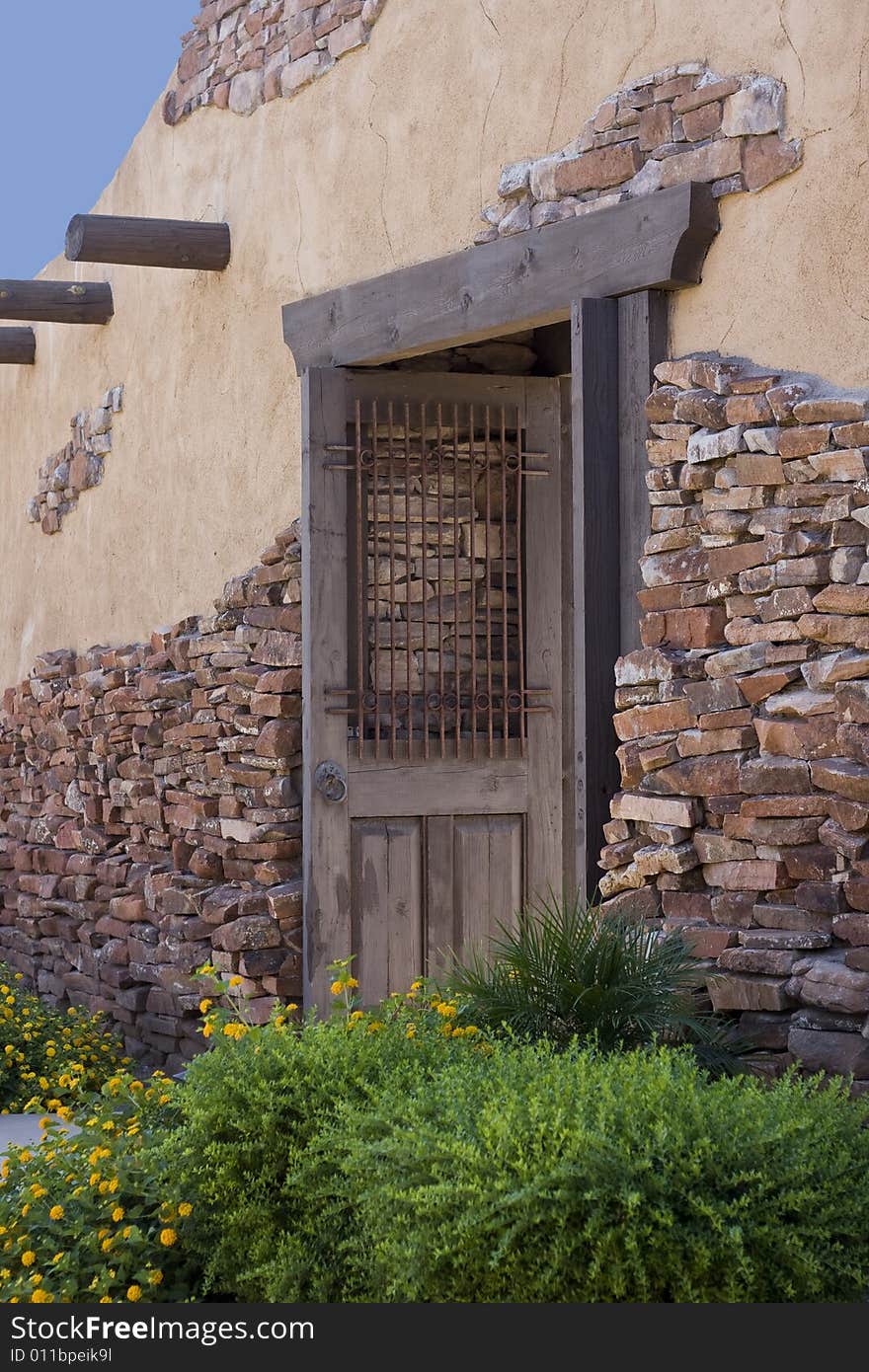 Closeup of an old iron and wooden door. Closeup of an old iron and wooden door