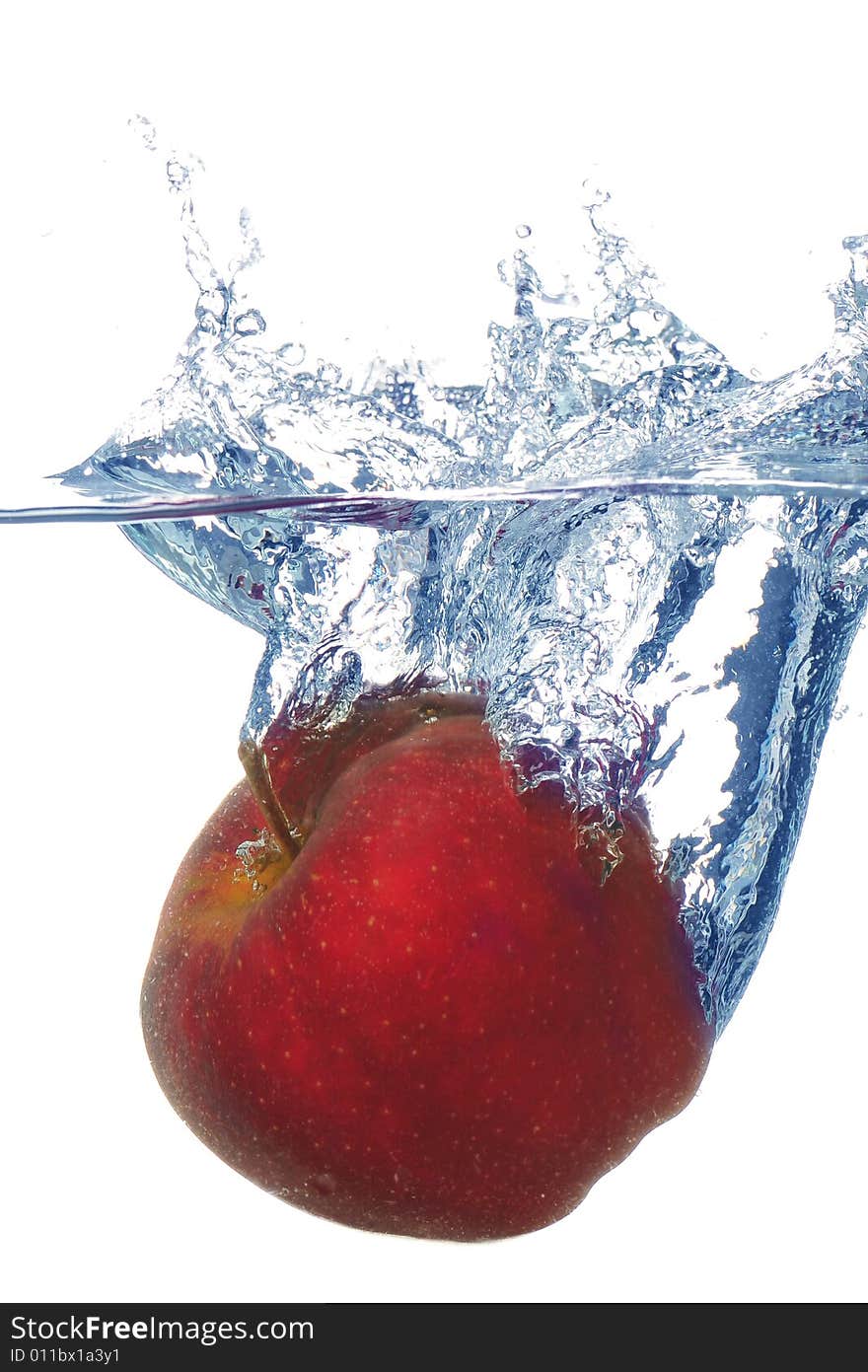 Splashing Apple Into A Water