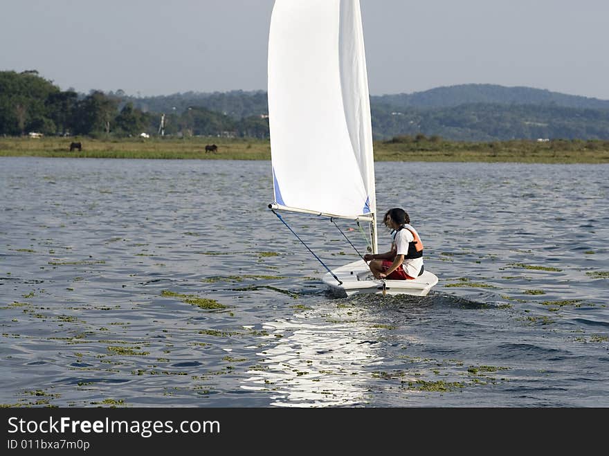 Couple Sailing on Lake - Horizontal