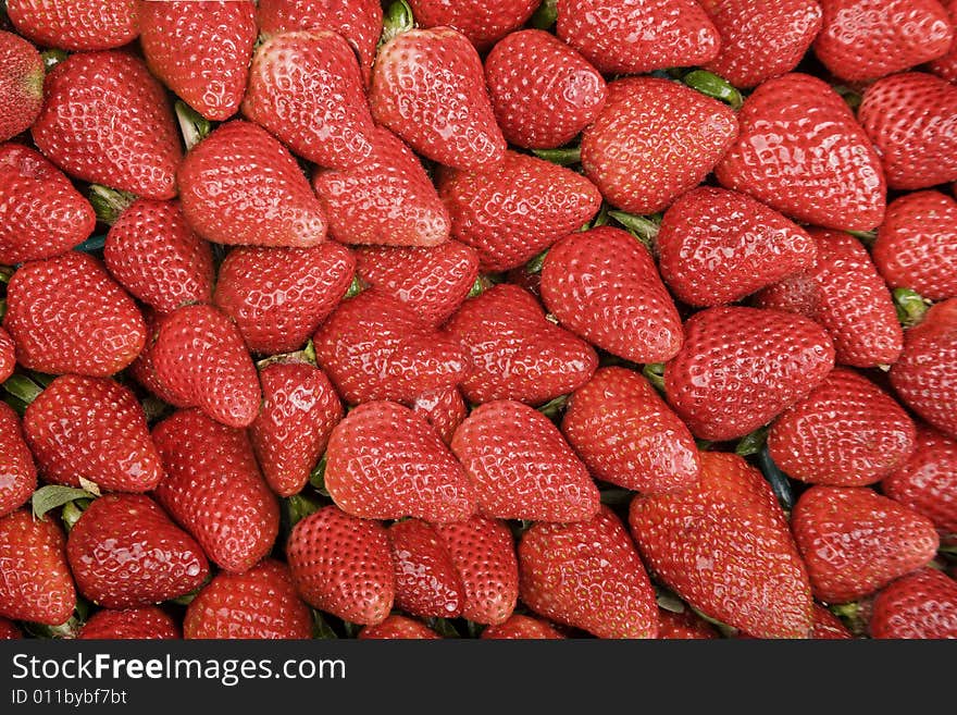 Bright Red Strawberries Filling the Entire Frame