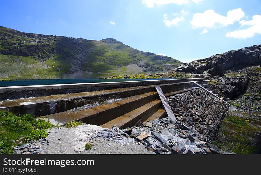 Reservoir water and dam in mountain