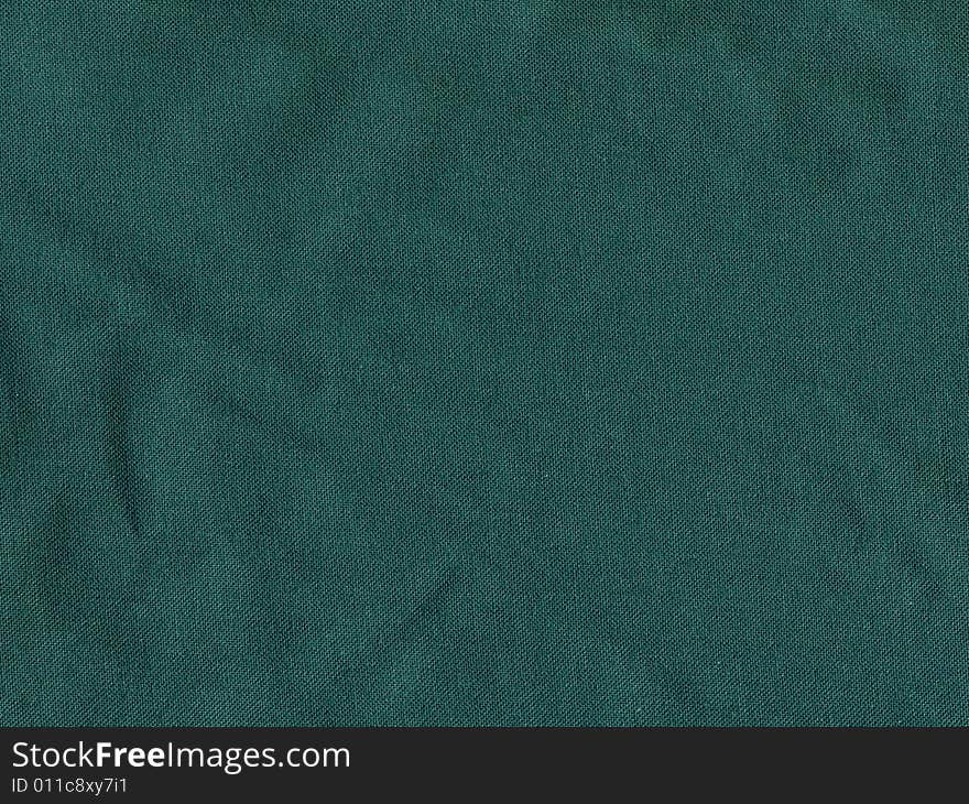 Scan of wrinkled green canvas surface, great for background