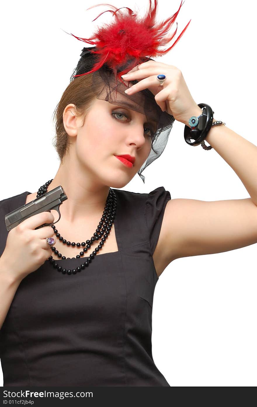 Beautiful girl with gun isolated over a white background