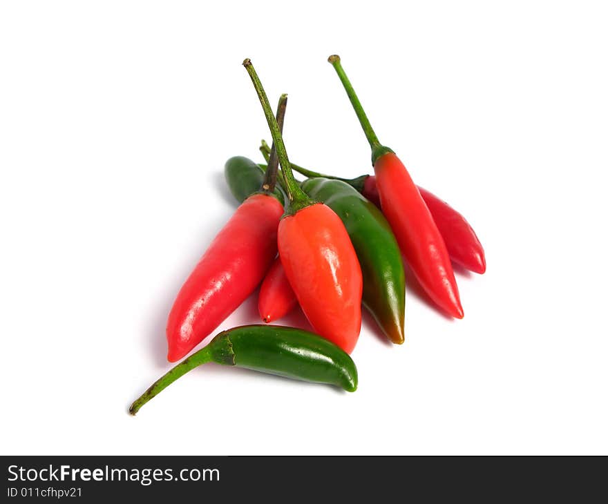 Two colors chilies on white background