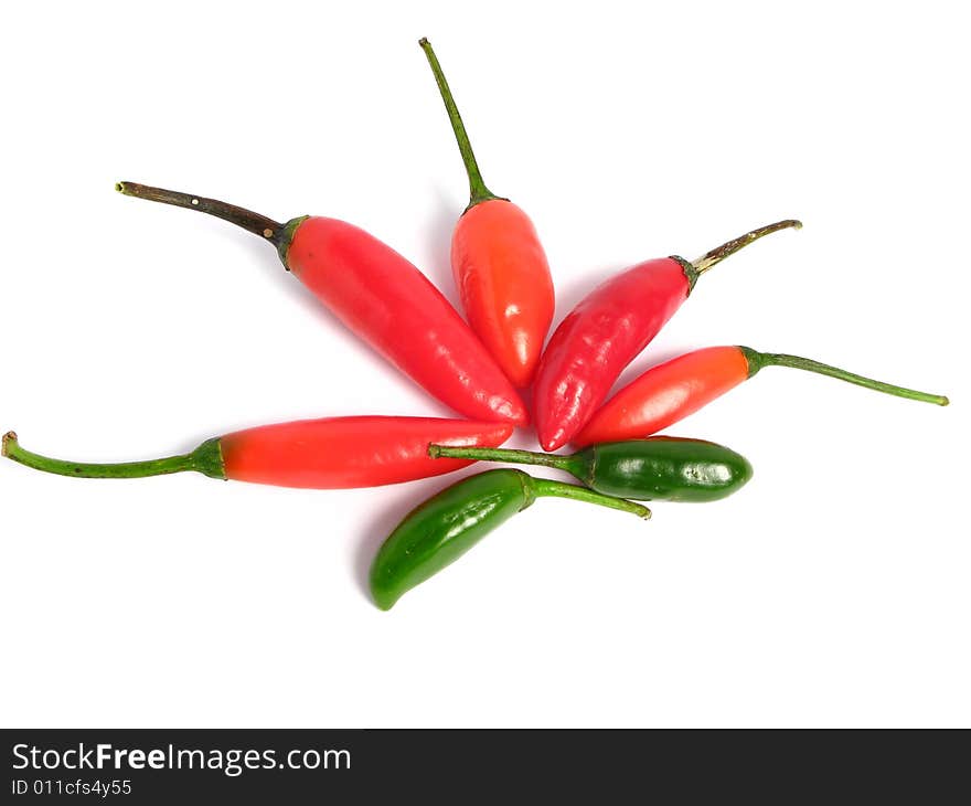 Two colors chilies group on white background