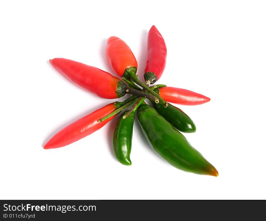 Two colors chilies group on white background