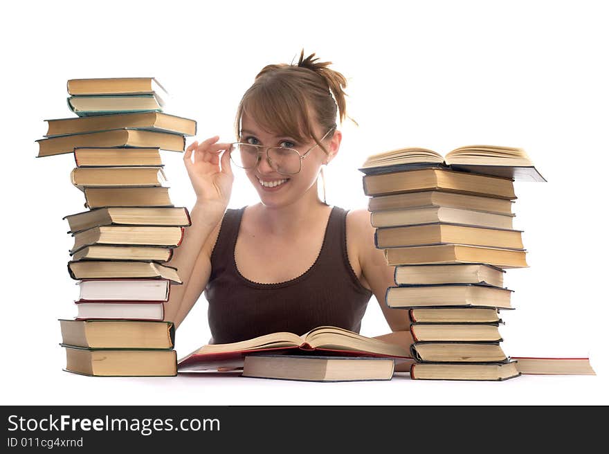 The young woman and a pile of books