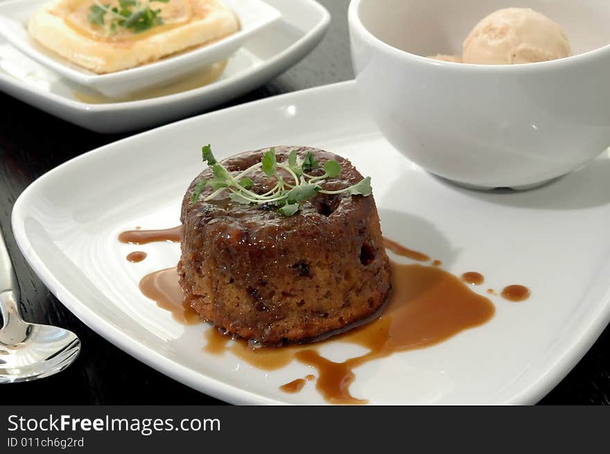 Spice cake with caramel sauce and ice cream. Spice cake with caramel sauce and ice cream