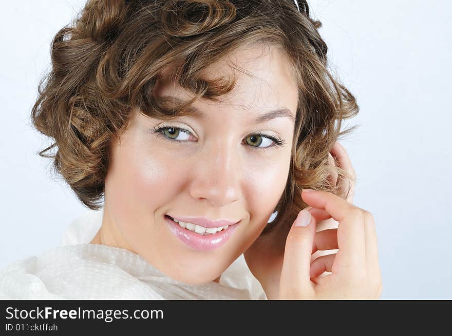 Portrait of the nice girl touching ones hair